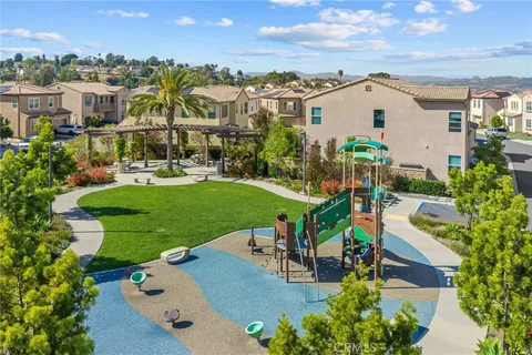 an aerial view of a house with outdoor space pool patio and outdoor seating