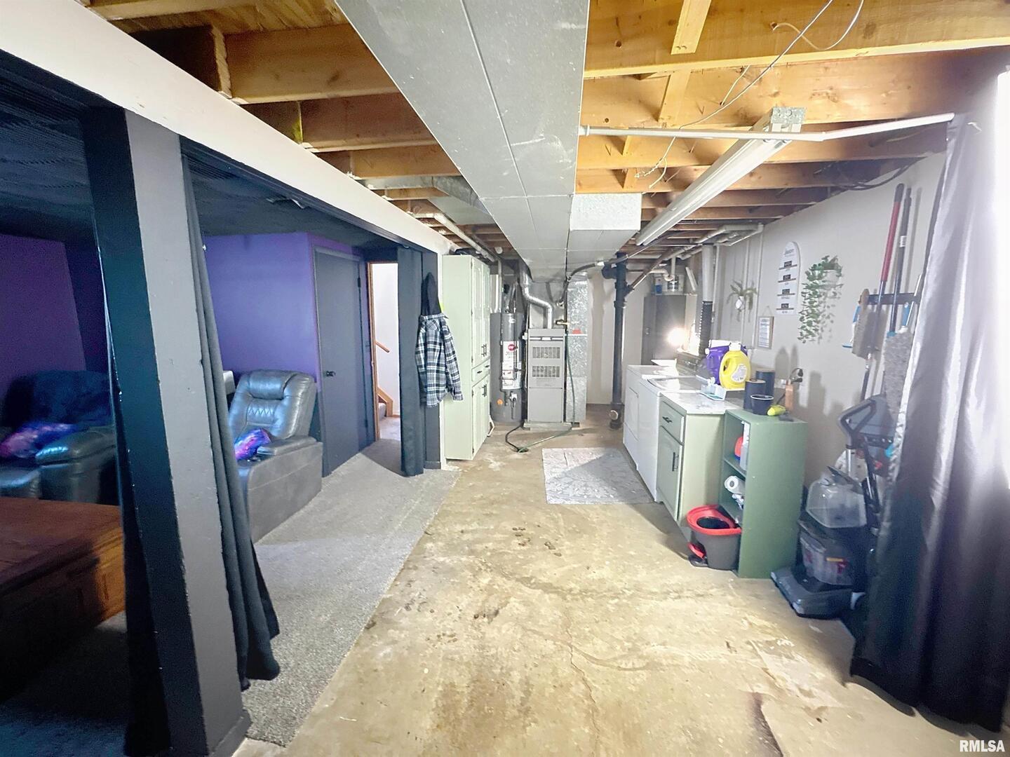 8119 10th Street West Rock Island, IL 61201 - Photo 15 of 25 a view of a hallway with a dining area