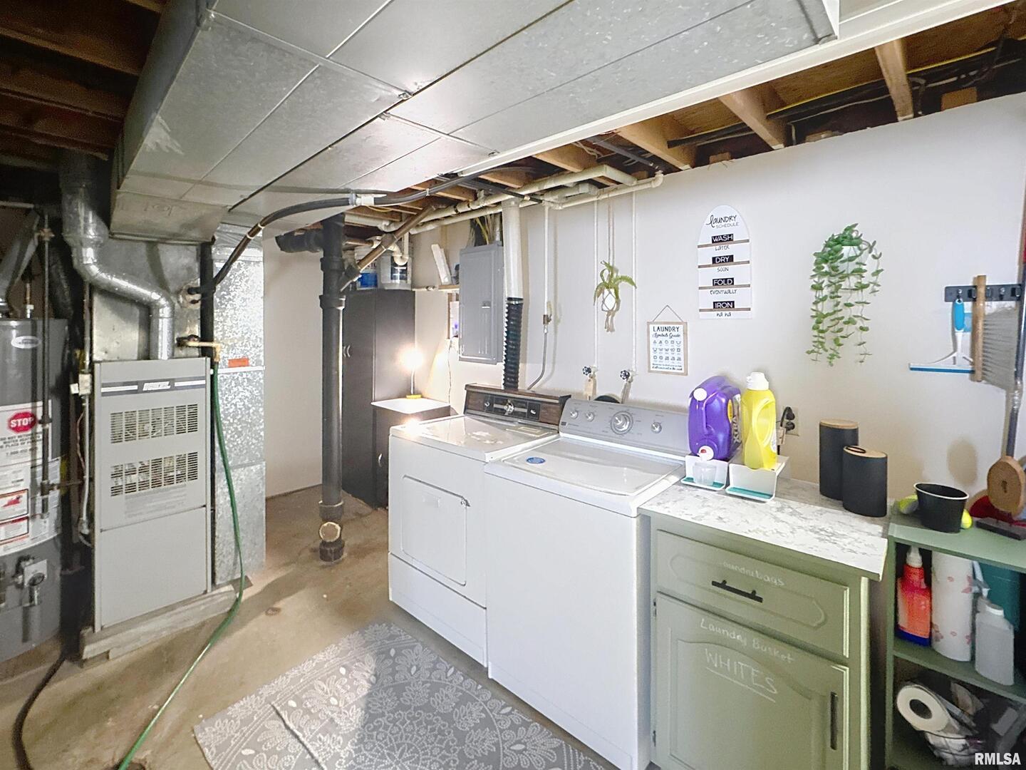 8119 10th Street West Rock Island, IL 61201 - Photo 18 of 25 a storage room with cabinets