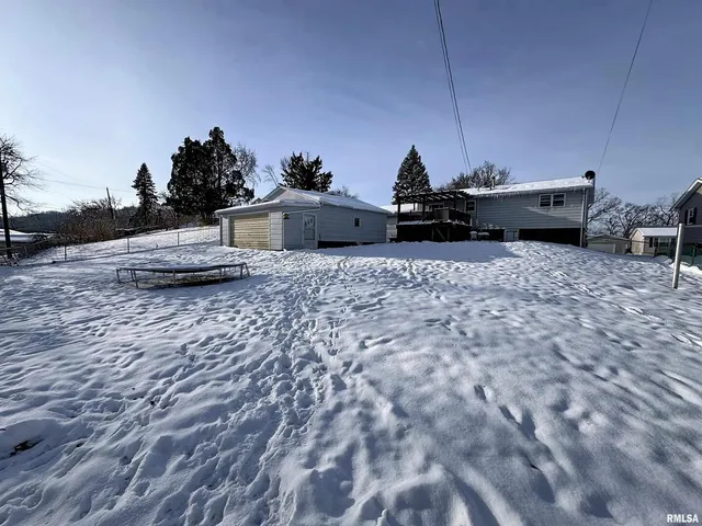 a bath room with a bed and a couch