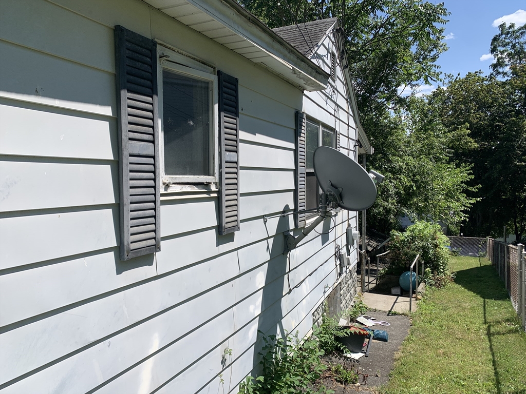 25 Johnson Street Worcester, MA 01604 - Photo 4 of 8 a view of a balcony with potted plants