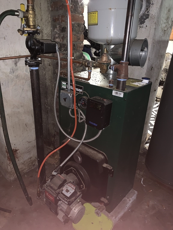 25 Johnson Street Worcester, MA 01604 - Photo 6 of 8 a room with gym equipment