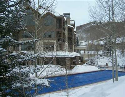 15 Highlands Lane, Unit R107 Beaver Creek, CO 81620 - Photo 1 of 8 a view of a house with a yard