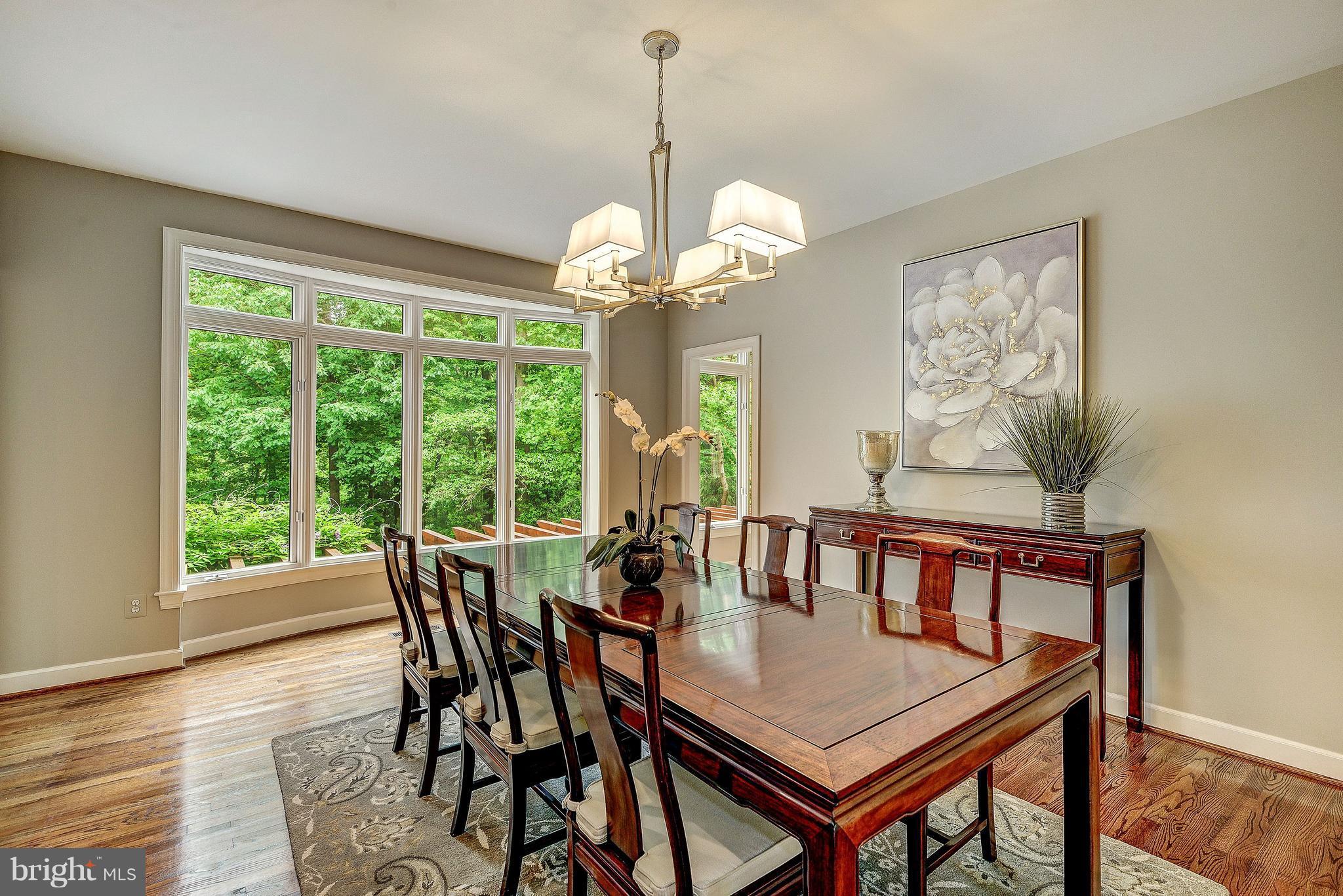 11225 Bright Pond Lane Reston, VA 20194 - Photo 4 of 30 Curved Windows In Dining Room Overlook Backyard