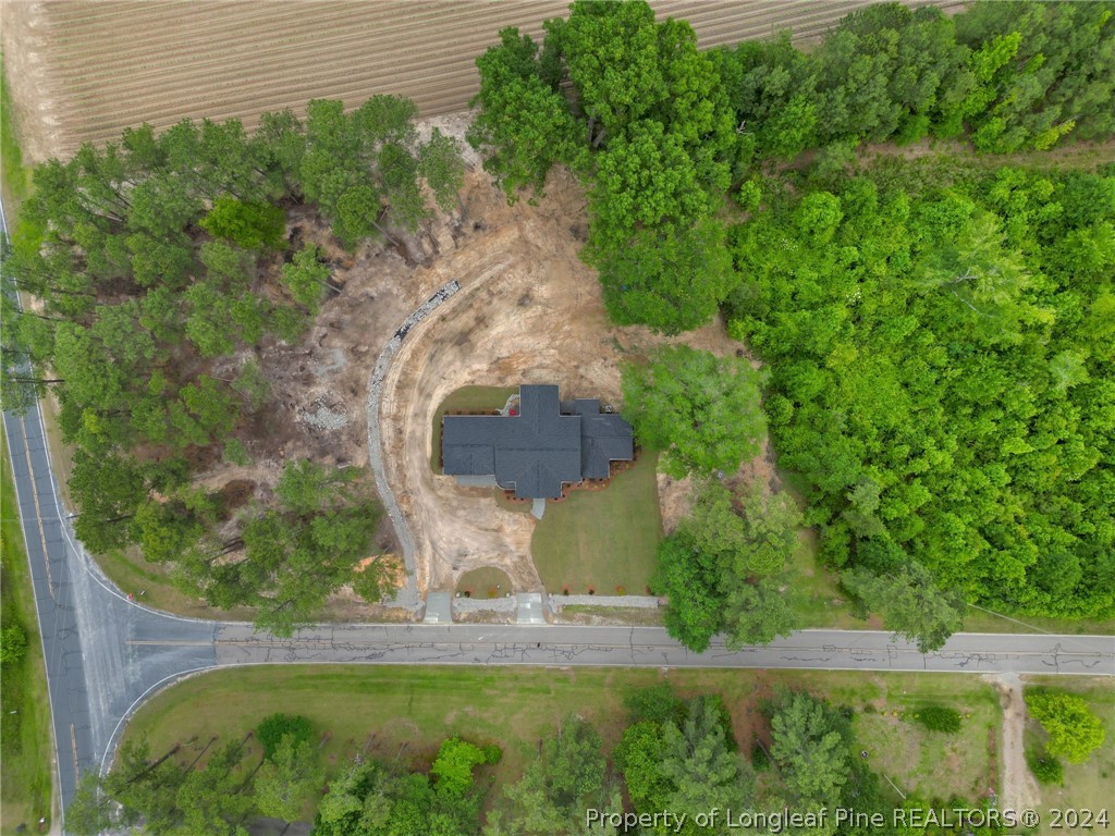 452 Brown Road Carthage, NC 28327 - Photo 2 of 50 an aerial view of a residential houses with outdoor space and trees all around