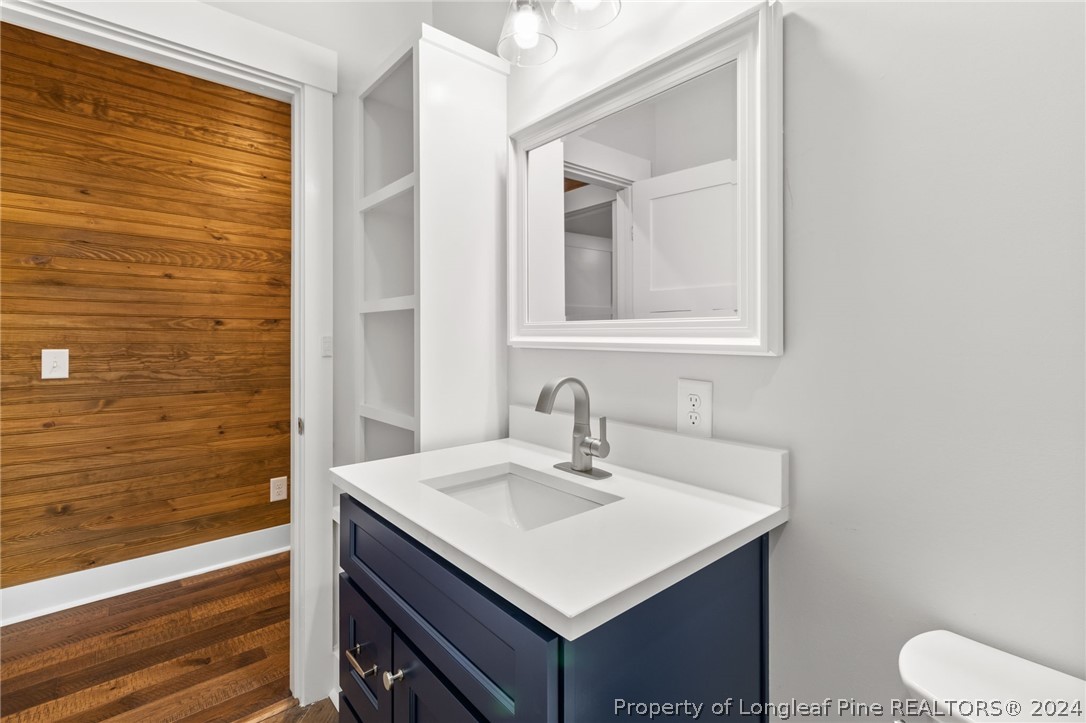452 Brown Road Carthage, NC 28327 - Photo 26 of 50 a bathroom with a sink vanity and a mirror