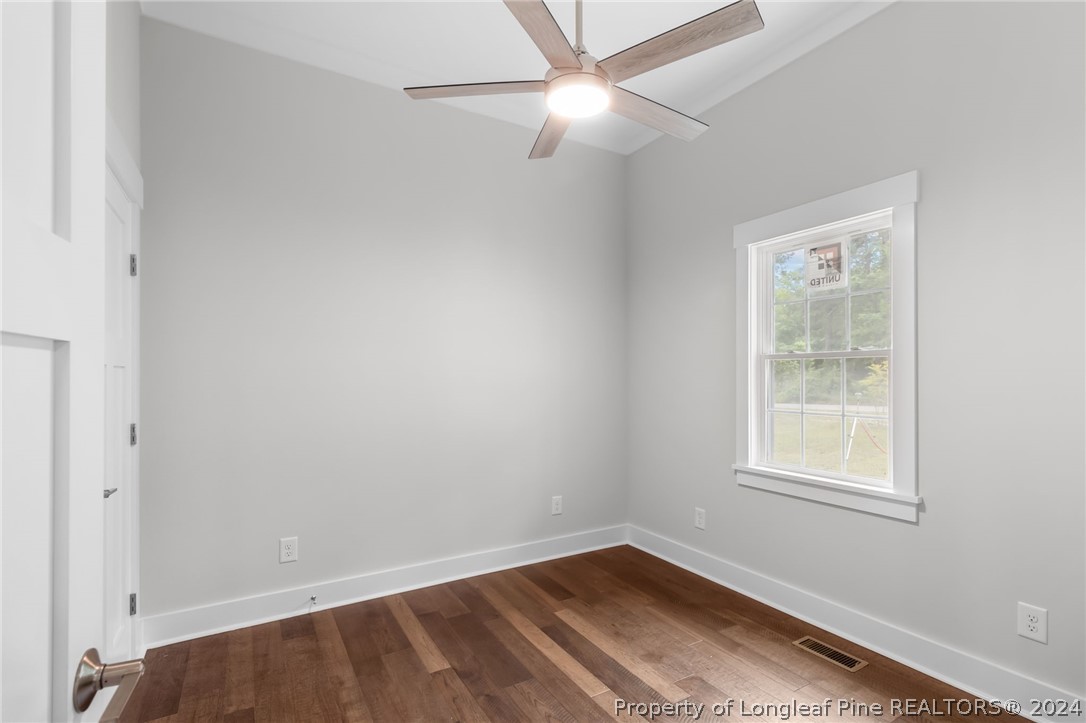 452 Brown Road Carthage, NC 28327 - Photo 30 of 50 an empty room with a window and a fan
