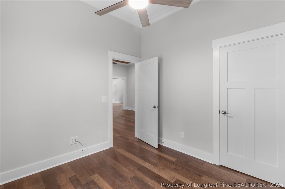 452 Brown Road Carthage, NC 28327 - Photo 31 of 50 an empty room with wooden floor fan and windows