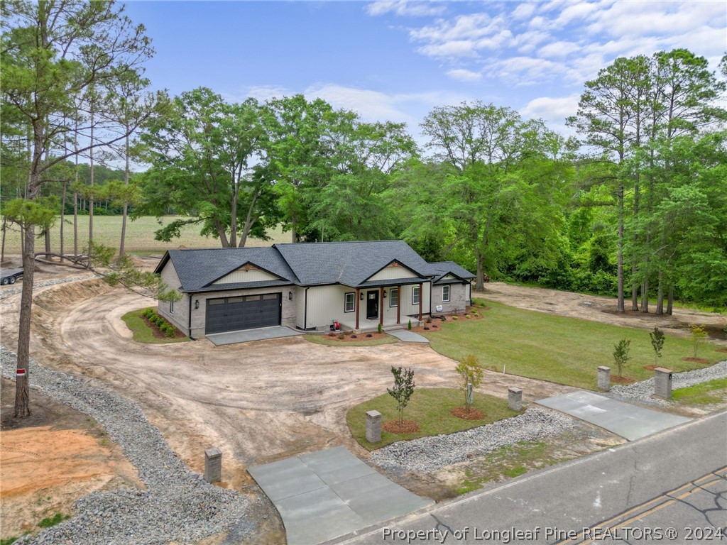 452 Brown Road Carthage, NC 28327 - Photo 4 of 50 a view of a house with a yard