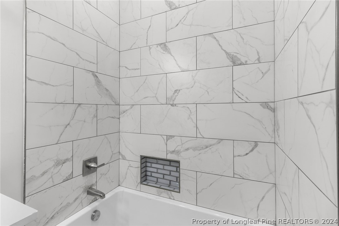 452 Brown Road Carthage, NC 28327 - Photo 41 of 50 a bathroom with a bathtub