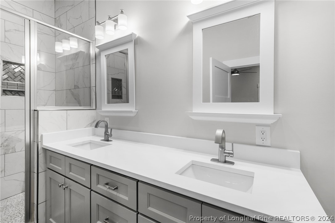 452 Brown Road Carthage, NC 28327 - Photo 42 of 50 a bathroom with a sink and a mirror