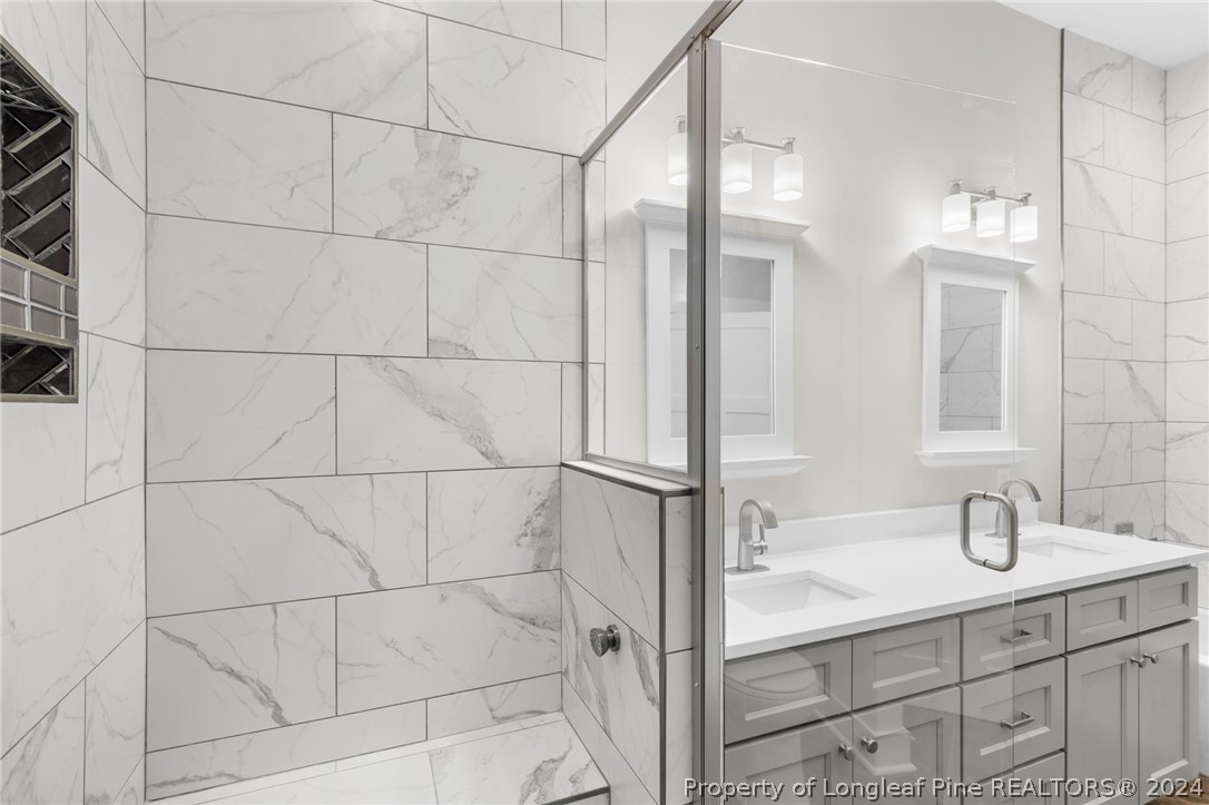 452 Brown Road Carthage, NC 28327 - Photo 45 of 50 a bathroom with a sink and a mirror
