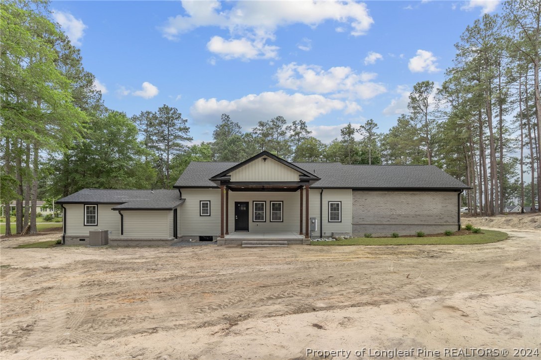 452 Brown Road Carthage, NC 28327 - Photo 47 of 50 a front view of a house with a garden