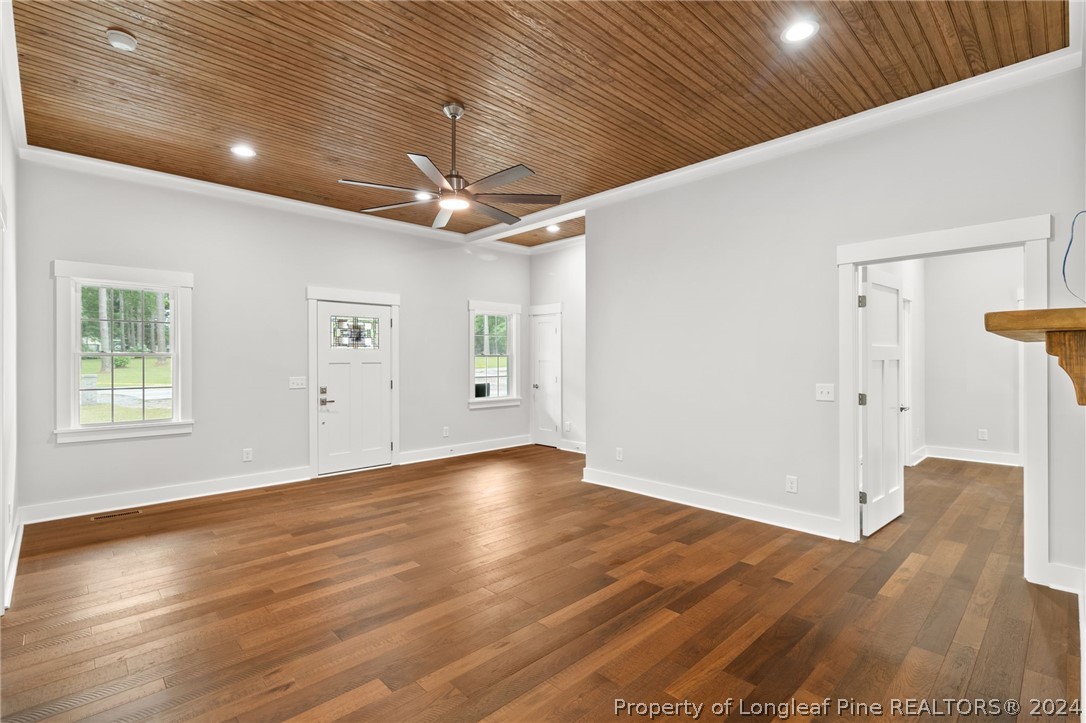 452 Brown Road Carthage, NC 28327 - Photo 9 of 50 a view of an empty room with wooden floor and a window