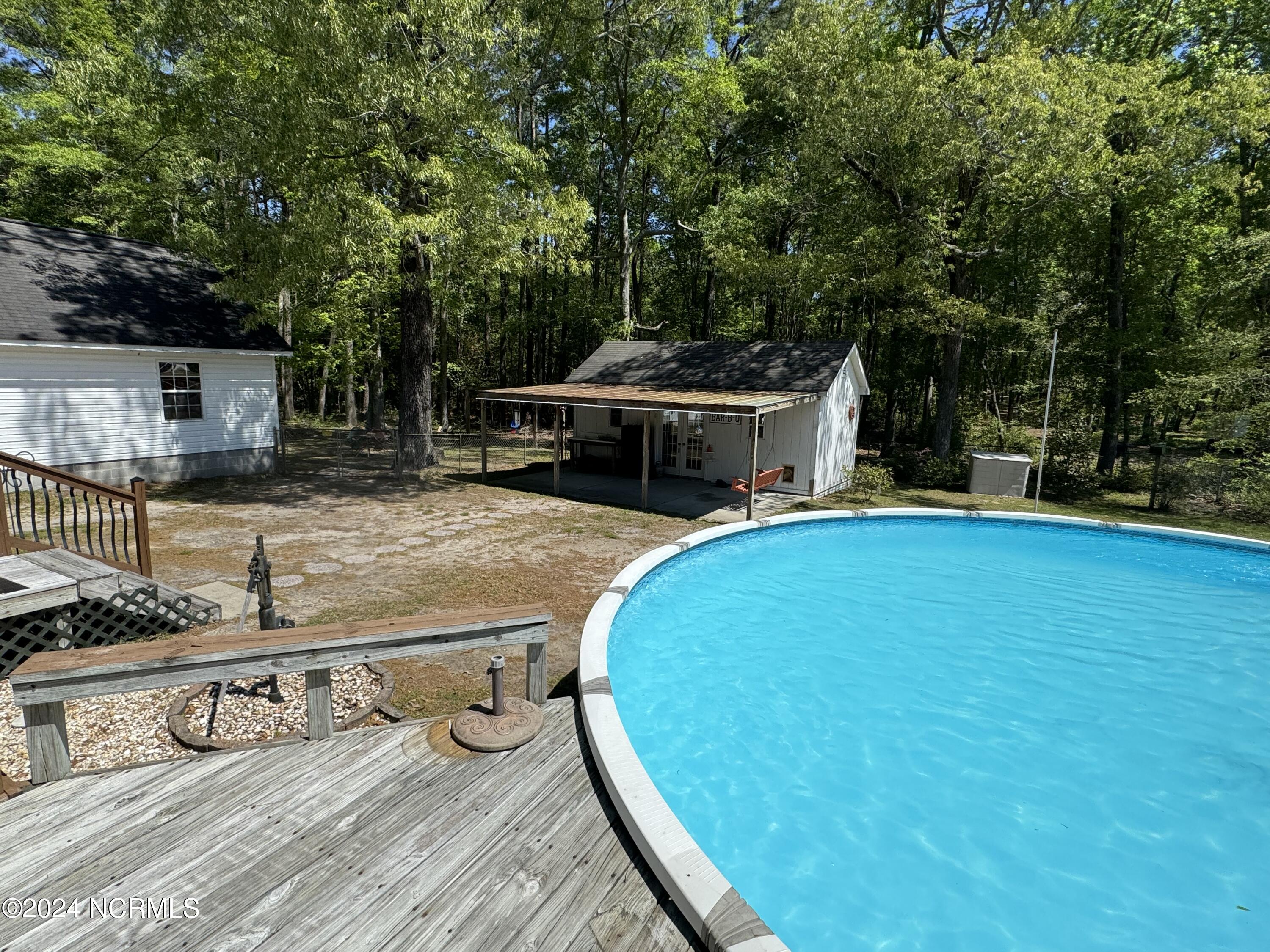 380 Sand Ridge Road New Bern, NC 28560 - Photo 23 of 35 380 pool and porch