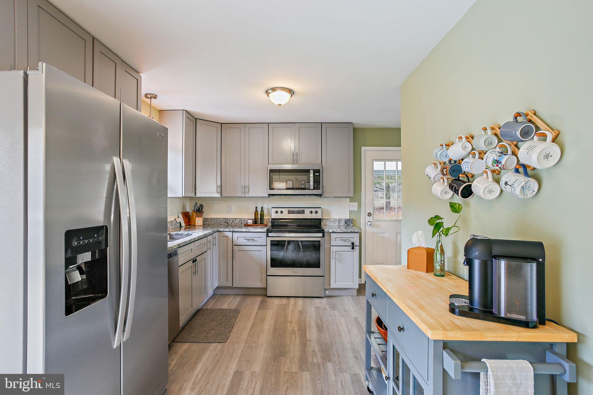 19028 Graystone Road White Hall, MD 21161 - Photo 9 of 44 Remodeled Kitchen with Stainless Appliances