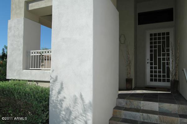 5218 East Hashknife Road Phoenix, AZ 85054 - Photo 4 of 25 Front entryway with lazy porch
