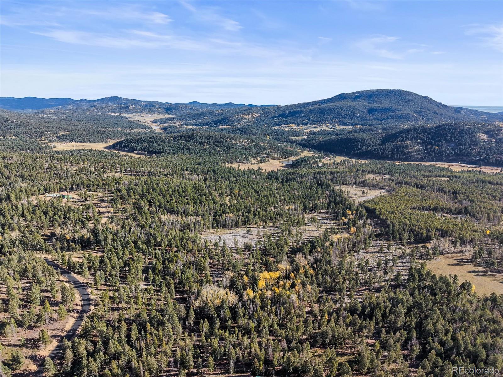 Parcel, Unit 4 Conifer, CO 80433 - Photo 17 of 23 an aerial view of residential house and green space