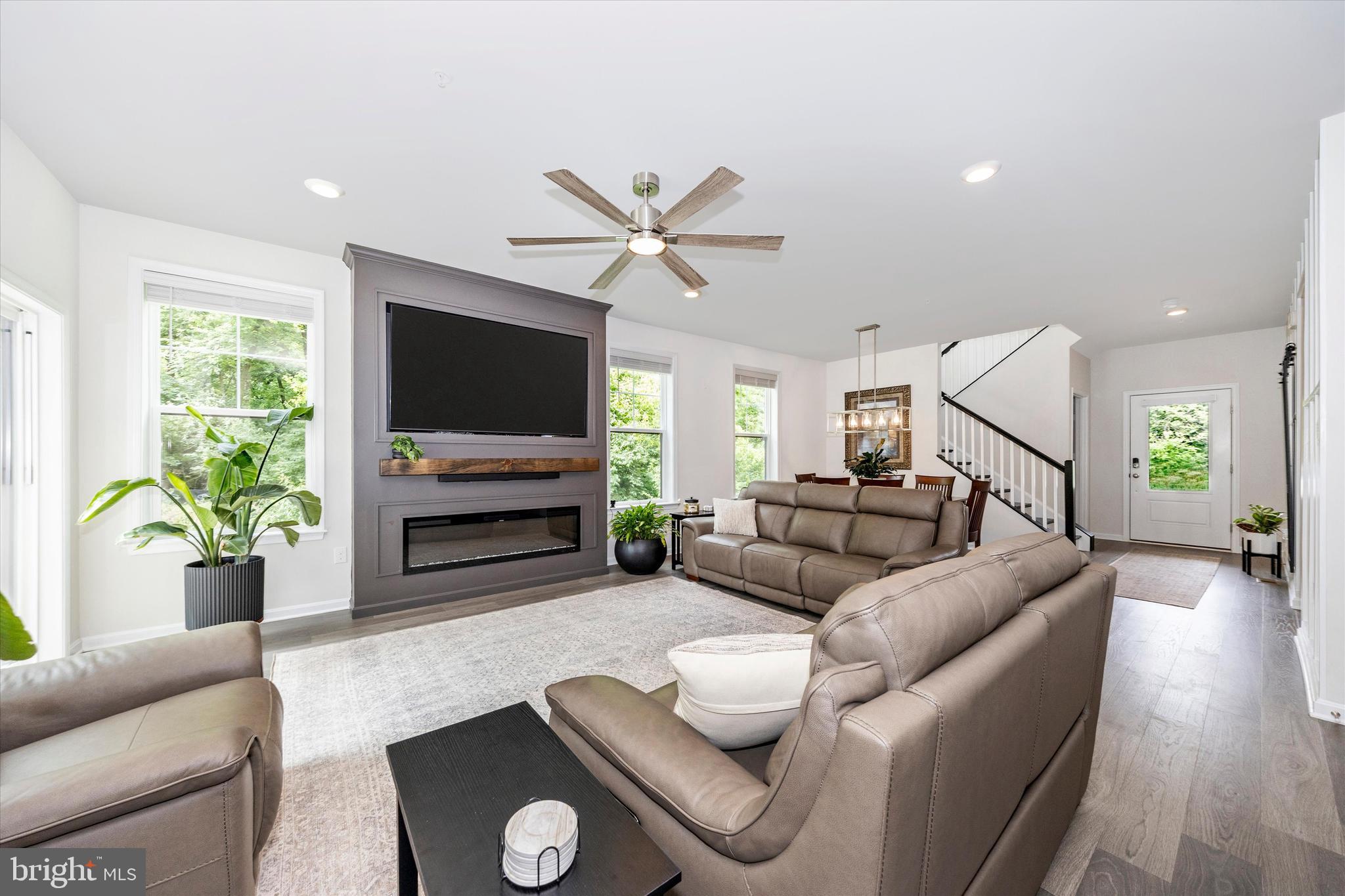 700 Bond Street Frederick, MD 21701 - Photo 9 of 49 a living room with furniture and a flat screen tv