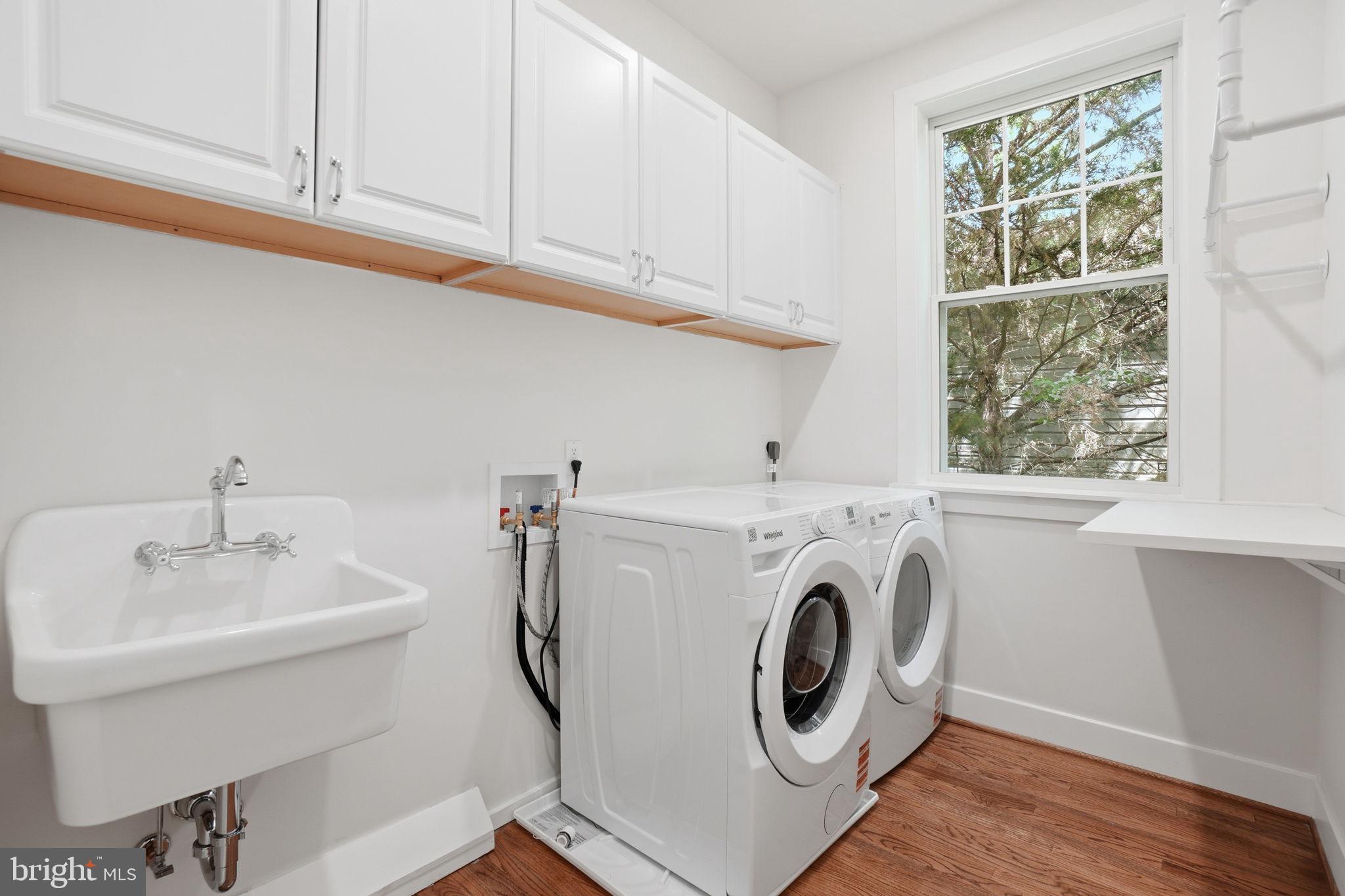 4720 Ellicott Street Northwest Washington, DC 20016 - Photo 26 of 52 a utility room with dryer and washer