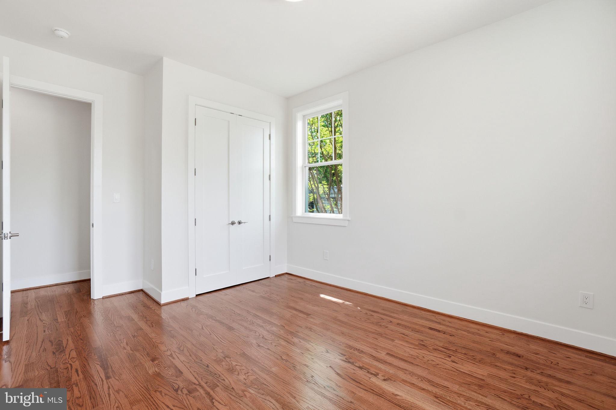 4720 Ellicott Street Northwest Washington, DC 20016 - Photo 28 of 52 a view of a room that has wooden floor in it