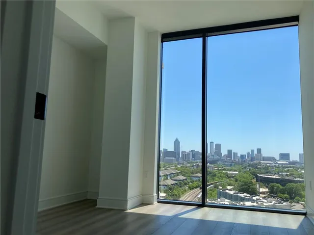 a view of a city from a living room