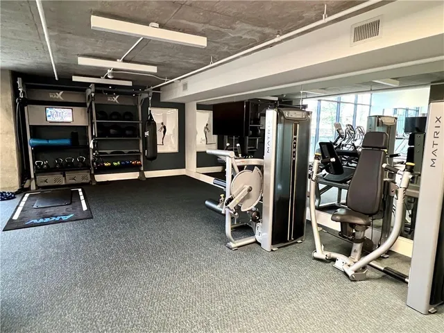 a view of a room with gym equipment
