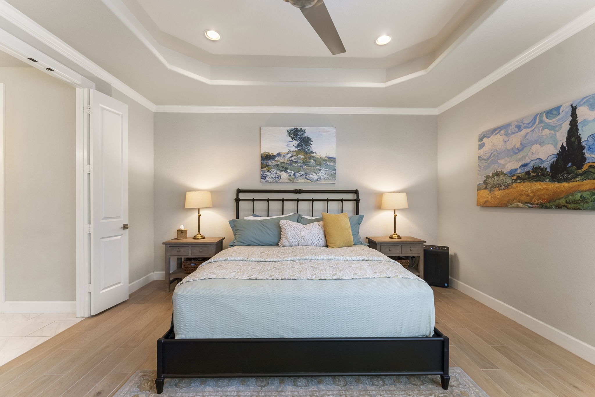 25607 Muirfield Bend Court Spring, TX 77389 - Photo 15 of 30 Spacious primary suite featuring a tray ceiling, generous proportions, and a serene atmosphere designed for comfort and relaxation.