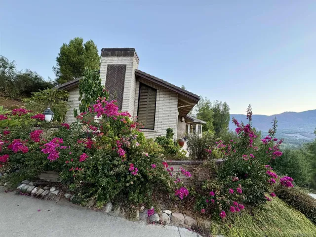 a view of a chairs and table in the patio