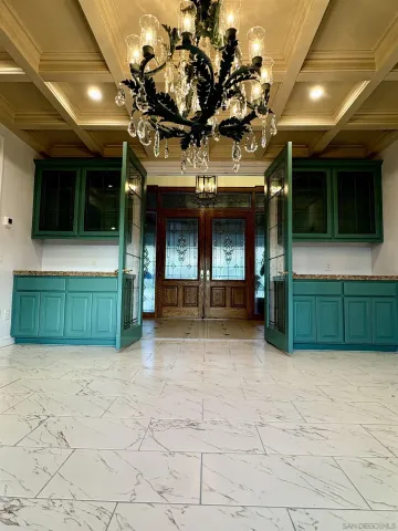 a view of a swimming pool with a yard