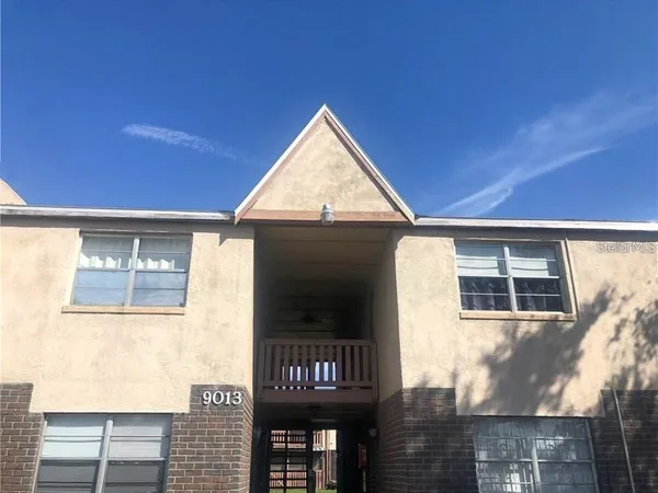 a view of a house with a porch