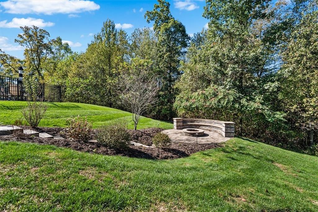 204 Durrow Court Mars, PA 16046 - Photo 12 of 24 a backyard of a house with outdoor seating and green space
