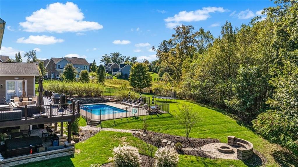 204 Durrow Court Mars, PA 16046 - Photo 19 of 24 a view of a swimming pool of a house with a yard
