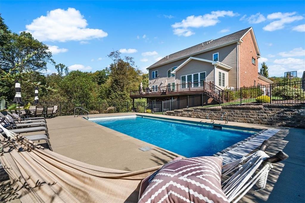 204 Durrow Court Mars, PA 16046 - Photo 7 of 24 a view of a house with pool and chairs