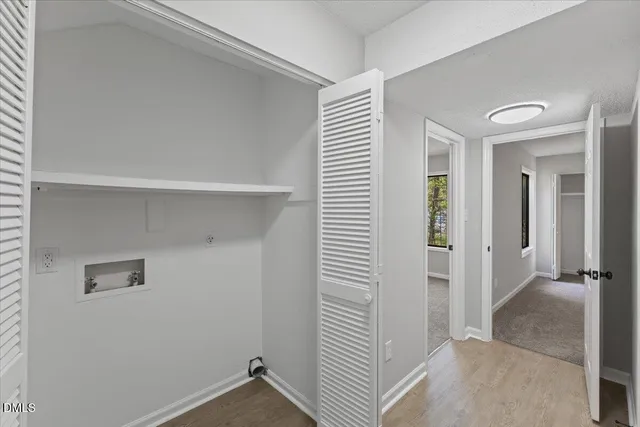 wooden floor and closet in a room
