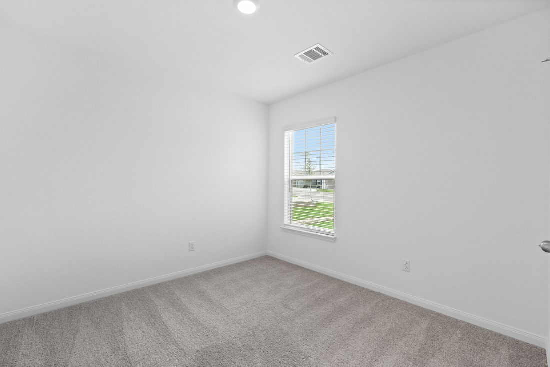 125 Morrison Drive Jarrell, TX 76537 - Photo 5 of 10 an empty room with a window