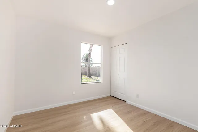 an empty room with windows