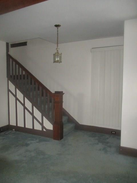 560 5th Street Butler, PA 16001 - Photo 3 of 20 Newly painted walls In Living Room where stairs go to upstairs