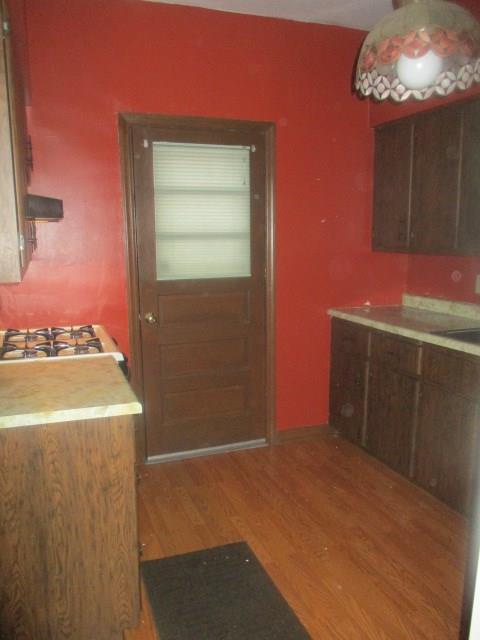 560 5th Street Butler, PA 16001 - Photo 7 of 20 Kichen back door which leads to back deck and yard. Also shows stove which is included