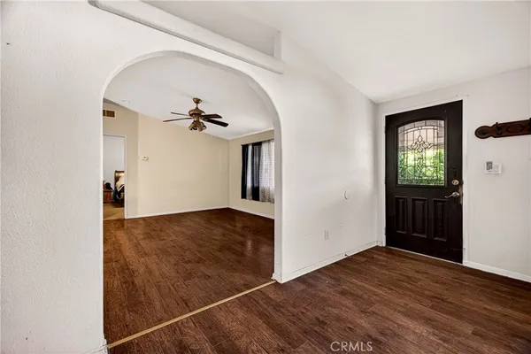 a kitchen with stainless steel appliances granite countertop a refrigerator stove and sink