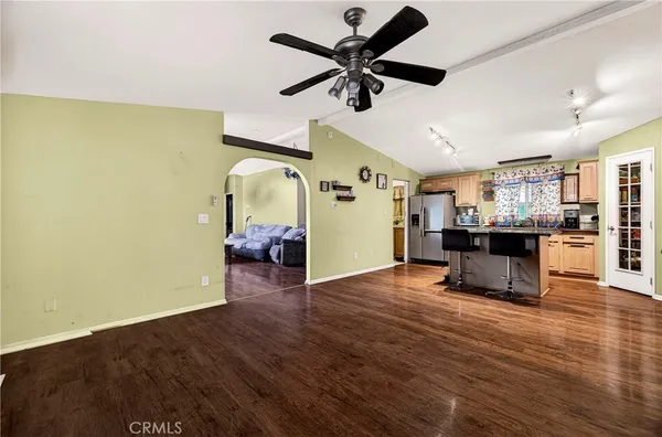 a bedroom with a bed and couch