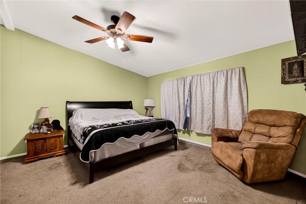 32 Sheldon Avenue Gridley, CA 95948 - Photo 25 of 75 a bedroom with a bed and couch