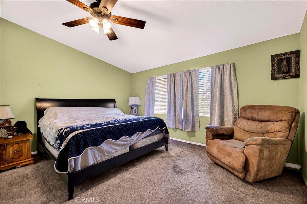 32 Sheldon Avenue Gridley, CA 95948 - Photo 26 of 75 a bedroom with a bed and a couch