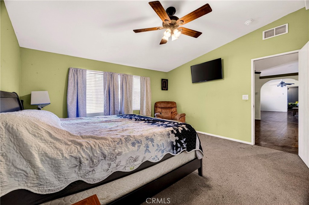 32 Sheldon Avenue Gridley, CA 95948 - Photo 27 of 75 a bedroom with a bed and a flat screen tv