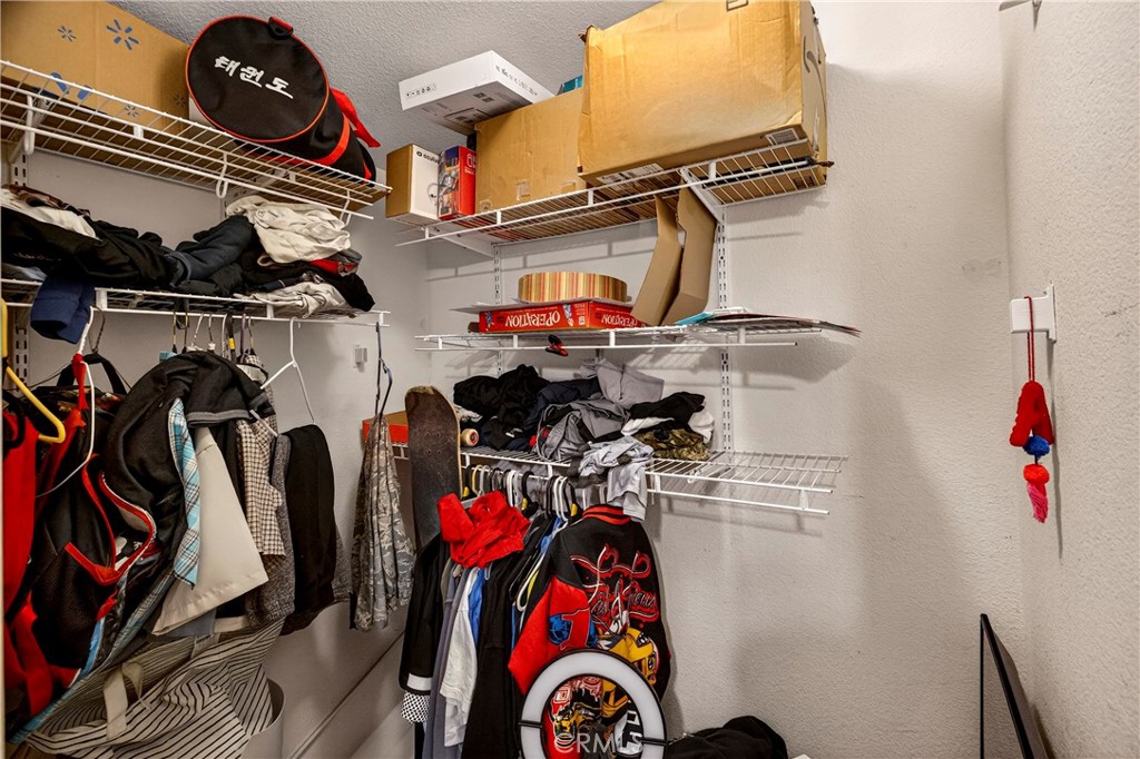 32 Sheldon Avenue Gridley, CA 95948 - Photo 40 of 75 a view of walk in closet with clothes