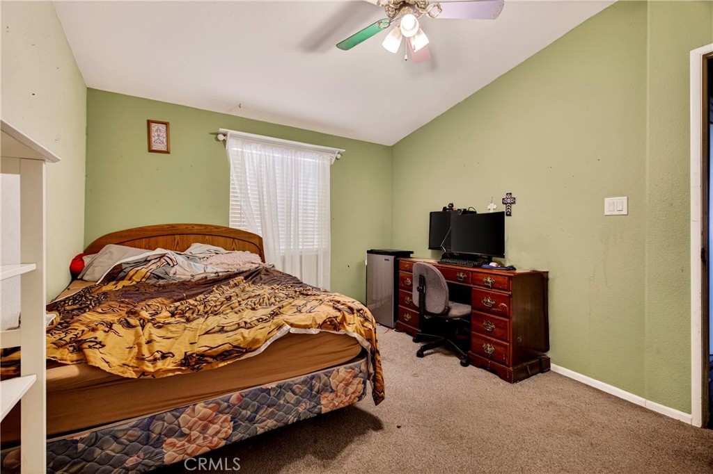 32 Sheldon Avenue Gridley, CA 95948 - Photo 42 of 75 a bedroom with a bed and a flat screen tv