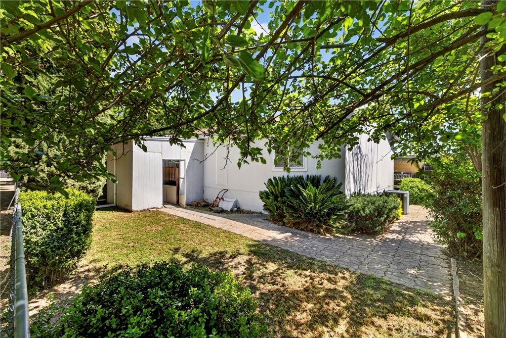 32 Sheldon Avenue Gridley, CA 95948 - Photo 61 of 75 a view of a house with a tree and garden