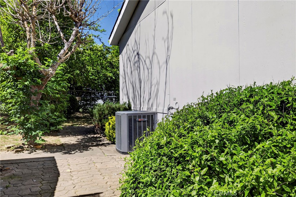 32 Sheldon Avenue Gridley, CA 95948 - Photo 62 of 75 a backyard of a house with a garden and plants