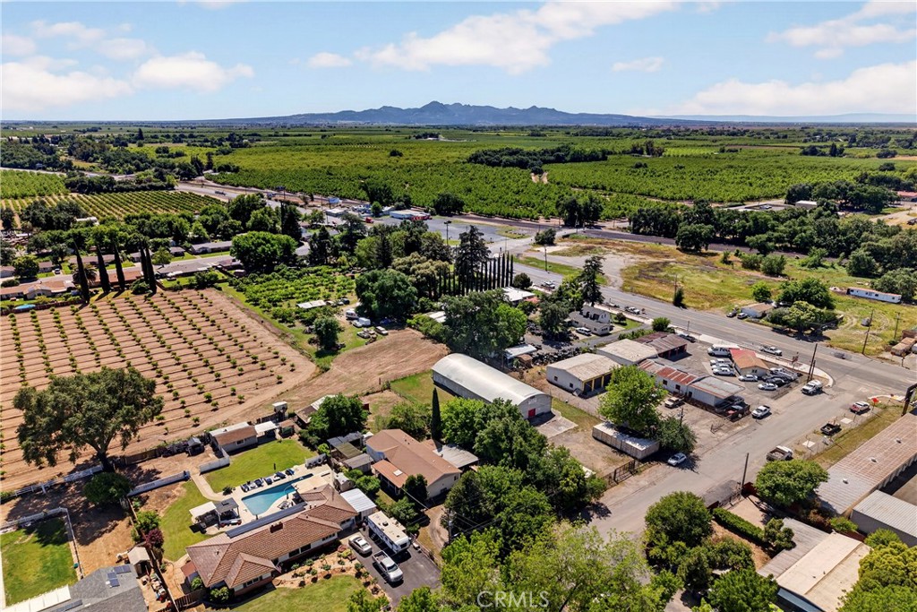 32 Sheldon Avenue Gridley, CA 95948 - Photo 72 of 75 an aerial view of a city with lots of residential buildings and mountain view in back