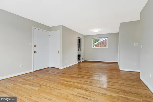 a kitchen with stainless steel appliances a stove a sink and a microwave